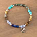 Sagittarius zodiac bracelet displayed on wood surface, handcrafted gemstone jewelry ideal for horoscope enthusiasts