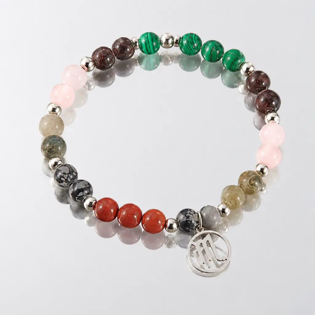 Scorpio crystal bracelet with polished gemstone beads and silver charm, luxury zodiac jewelry for everyday elegance