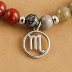 Scorpio crystal bracelet displaying natural gemstone details and zodiac charm, stylish horoscope jewelry accessory
