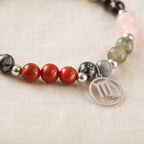 Scorpio crystal bracelet showcasing a silver Scorpio charm, premium astrology jewelry for personal expression