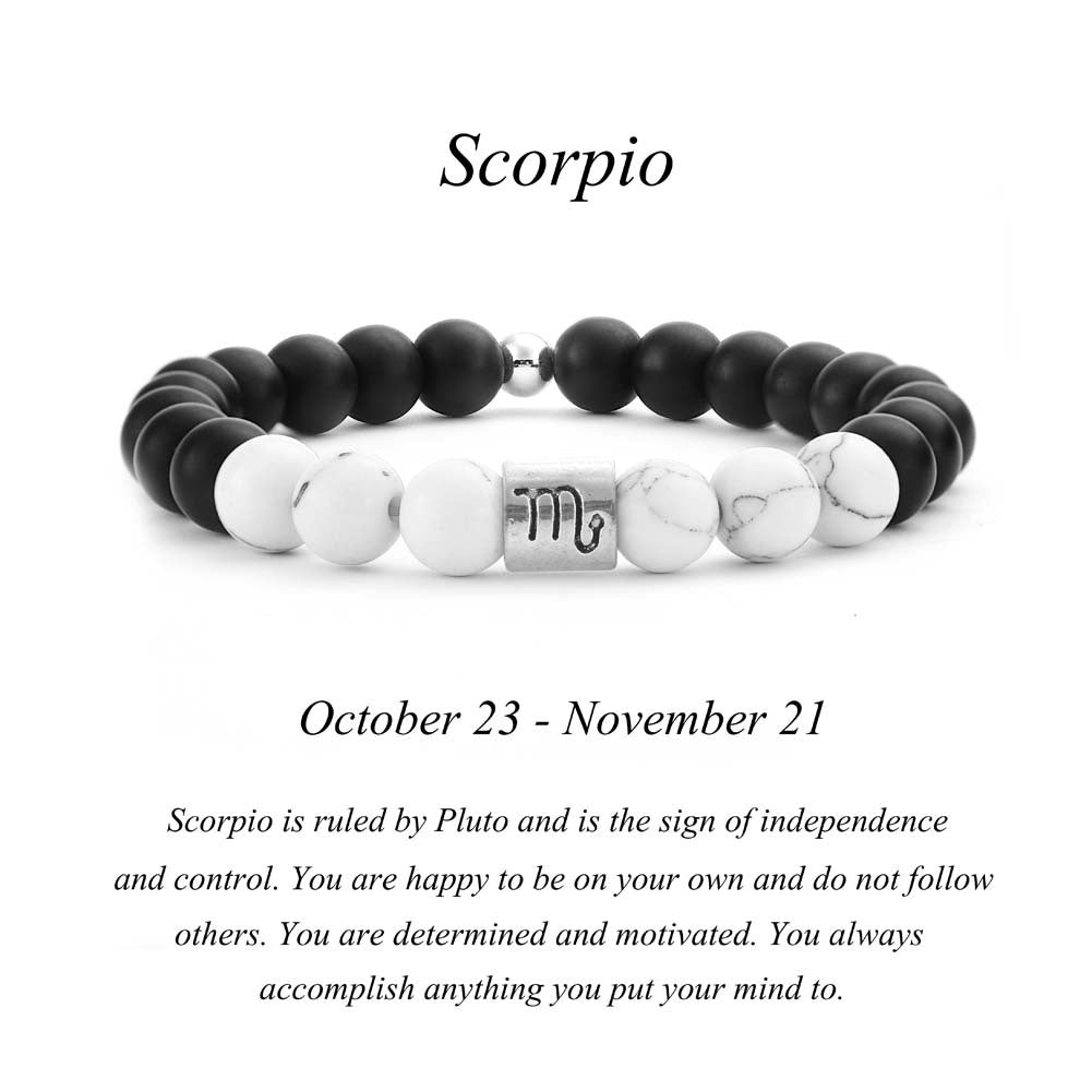 Scorpio zodiac bracelet with matte black Agate and white Howlite beads and a silver Scorpio charm on white background