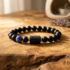 Scorpio Zodiac Bracelet on rustic wood surface with matte black beads, stylish astrology jewelry enhancing grounding energy and confidence