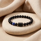 Scorpio Zodiac Bracelet on neutral stone with soft fabric backdrop, natural energy bracelet designed for grounding and balance