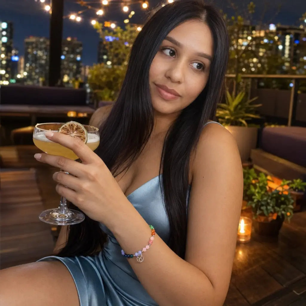 Taurus crystal bracelet worn at a rooftop gathering featuring crystal gemstone jewelry and chic zodiac inspired style