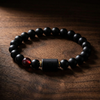Taurus Zodiac Bracelet on dark wood surface with black beads and tiger eye stone, luxury astrology jewelry symbolizing stability and power