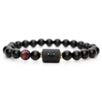 Taurus Zodiac Bracelet with black matte beads and red tiger eye accent, minimalist astrology jewelry for strength grounding energy