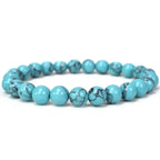Turquoise beaded bracelet on a white background