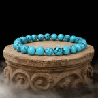 Teal howlite gemstone bracelet featuring smooth natural beads and crystal jewelry for stylish wellness wear