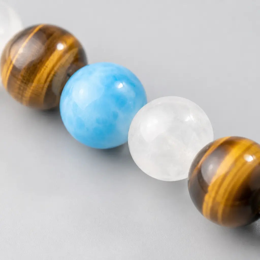 Tiger eye bracelet detailed bead arrangement with blue crystal stones and natural gemstone styling