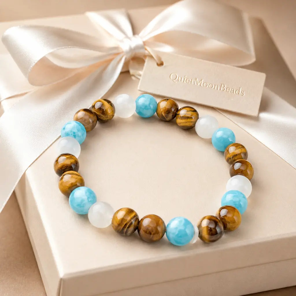 Tiger eye bracelet displayed with elegant ribbon gift packaging and crystal stone jewelry for memorable gifting
