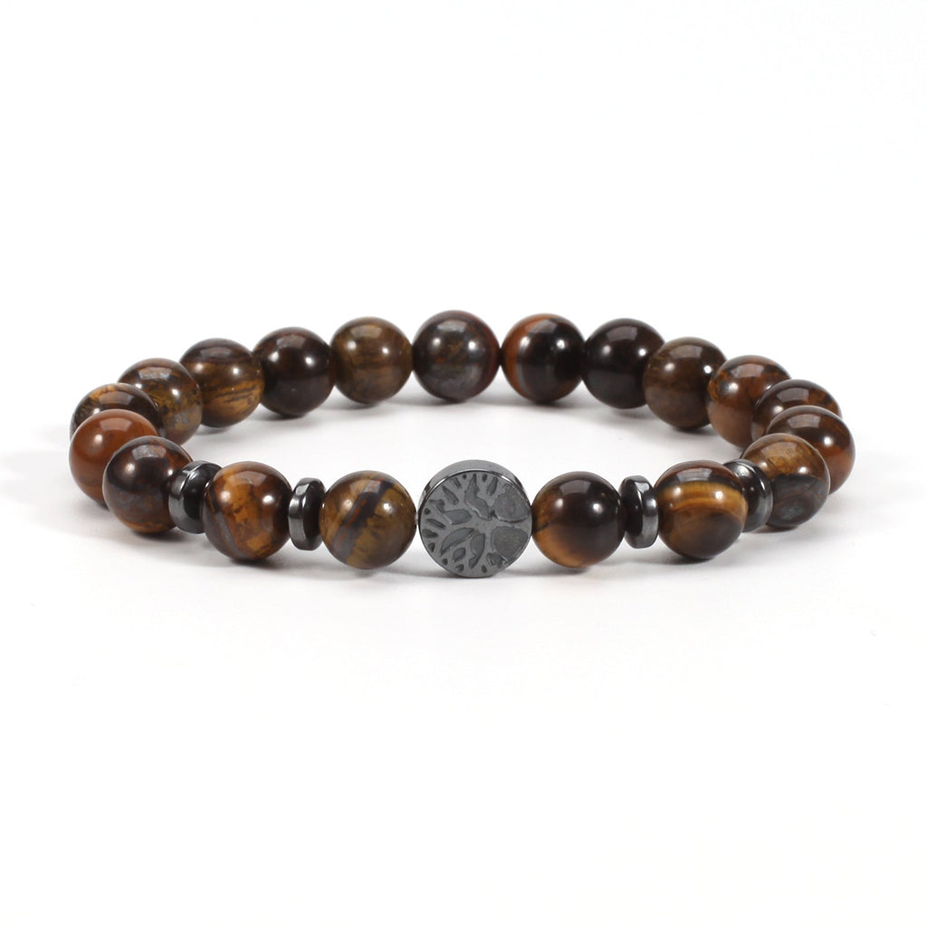 Tiger eye bracelet with glossy brown-gold 8mm round beads, four dark spacer rings, and a round tree-design focal bead, shown in a clean full front view on a plain white background.