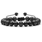 Tiger eye couple bracelets displayed as a black-on-black pair with porous and smooth matte round beads, twin rows, and a central adjustable braided closure in a clear product view.