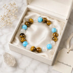 Tiger eye bracelet displayed in a premium jewelry gift box with blue and white gemstone beads for elegant gifting