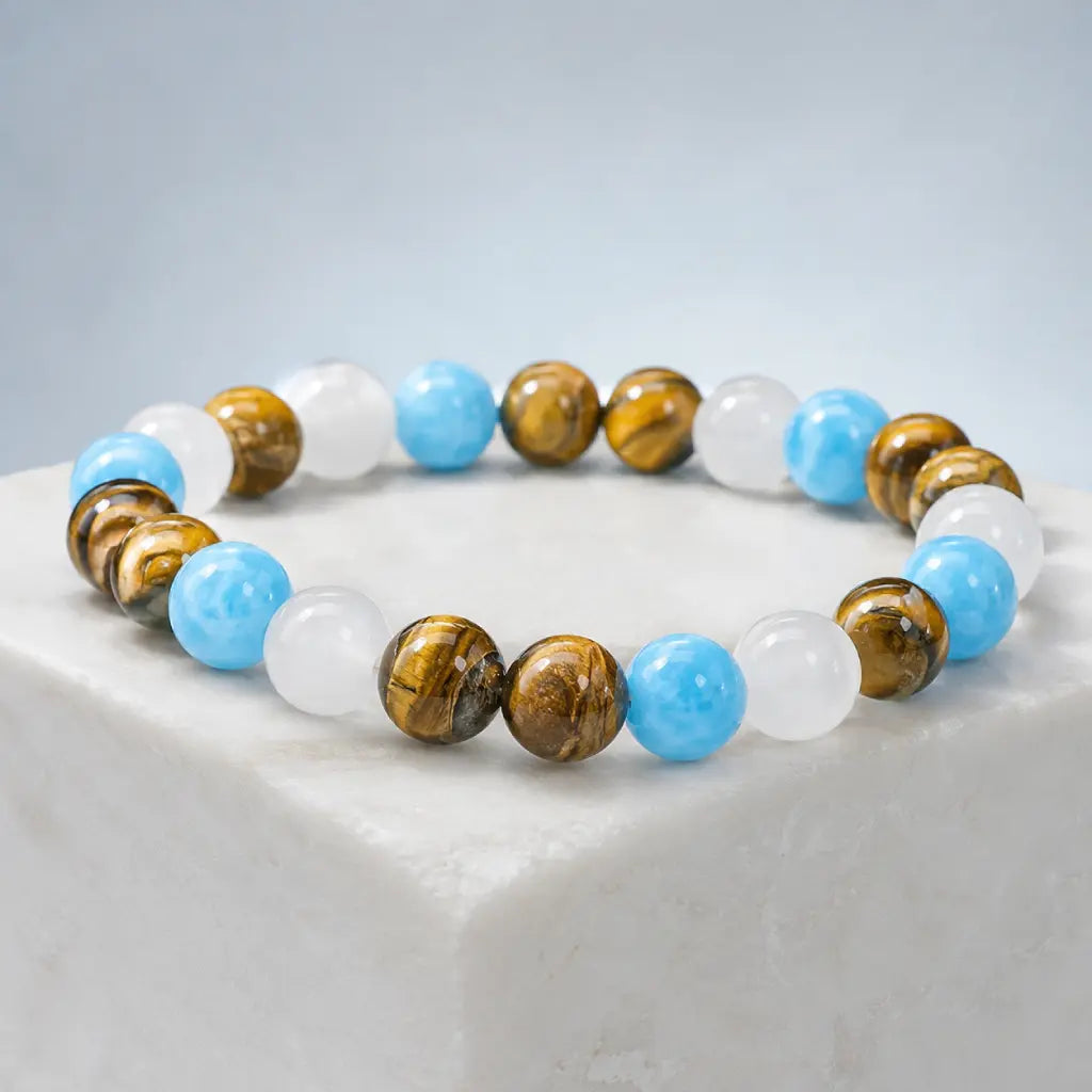 Tiger eye bracelet arranged with natural crystal beads showcasing elegant gemstone jewelry craftsmanship