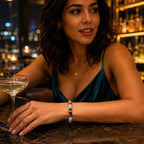 Tiger eye bracelet worn with upscale fashion and natural crystal jewelry for timeless premium style