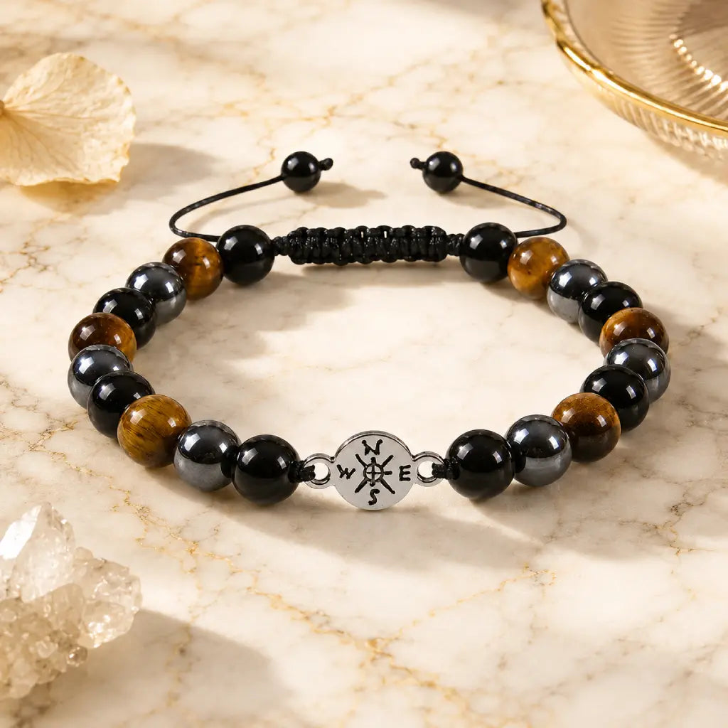 Tigereye bracelet featuring polished brown stones and black beads for grounding energy style