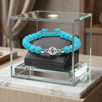 Turquoise bracelet featuring polished blue beads and braided adjustable closure for modern wellness style