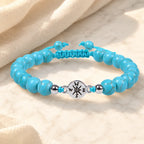 Turquoise bracelet with polished blue stone beads and silver accents for timeless healing jewelry style