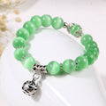 Verdant Focus Green Catseye Bracelet made with genuine natural green gemstone beads in a spiritual 17 cm bracelet design for everyday wear.