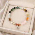 Virgo crystal bracelet displayed in luxury gift box, featuring healing gemstones and zodiac charm for special gifting