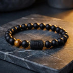 Virgo zodiac bracelet on slate with black beads and tiger eye accent under warm light for premium gift appeal today