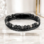 Volcanic Rock Larvikite bracelet on clear display stand with braided leather and lava beads for premium appeal