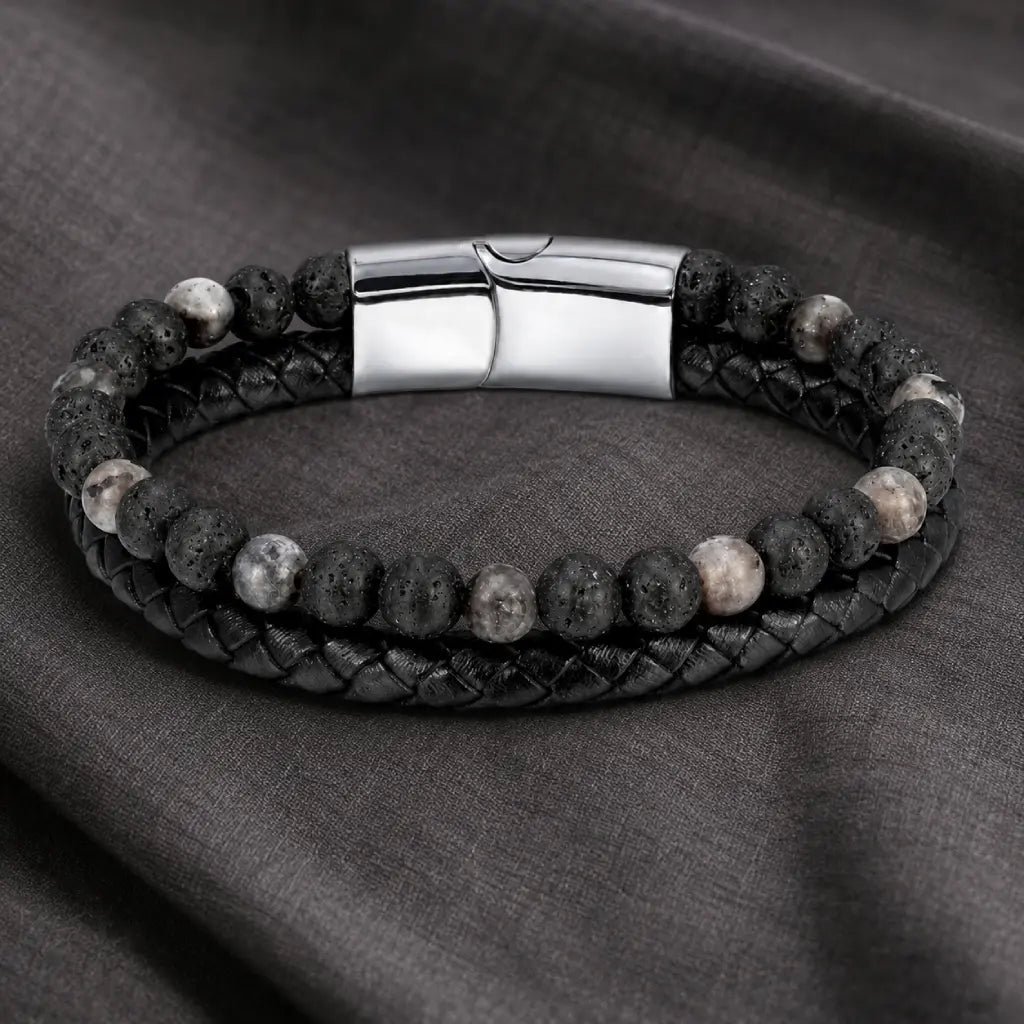 Volcanic Rock Larvikite bracelet on fabric surface with braided leather and natural stone beads for style