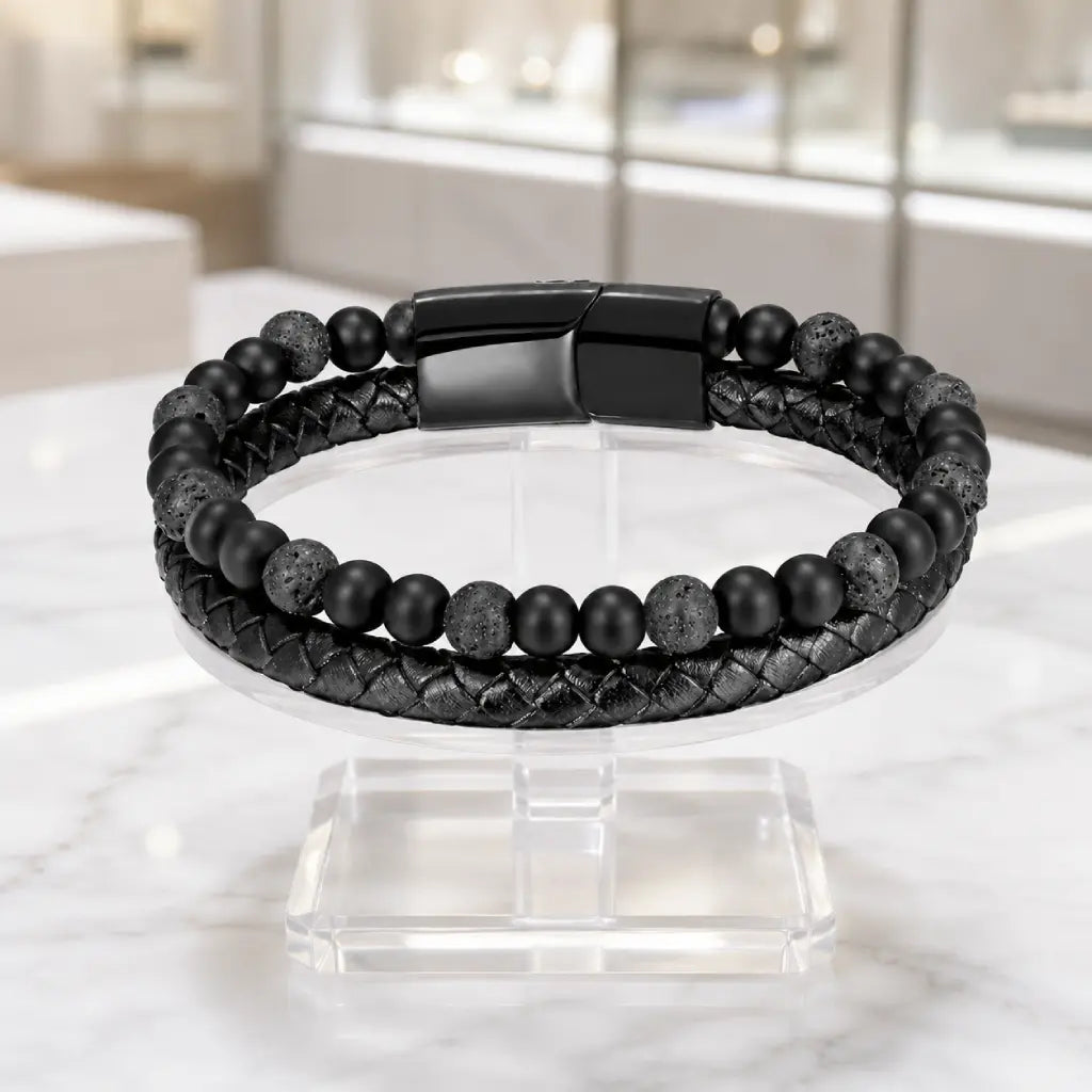 Volcanic Rock bracelet with matte beads and braided leather featuring sleek black clasp for bold style