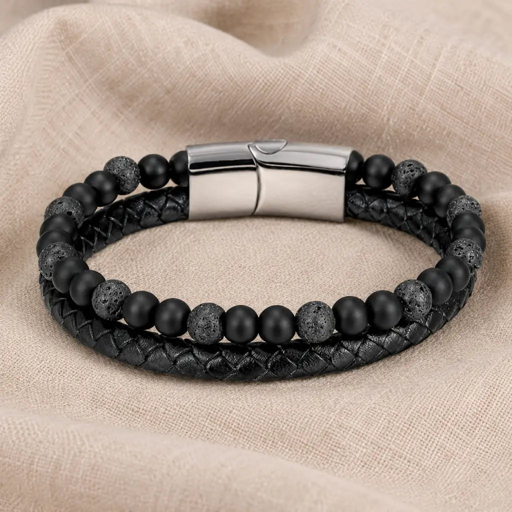 Volcanic Rock bracelet with braided leather and lava beads on soft fabric background for premium appeal