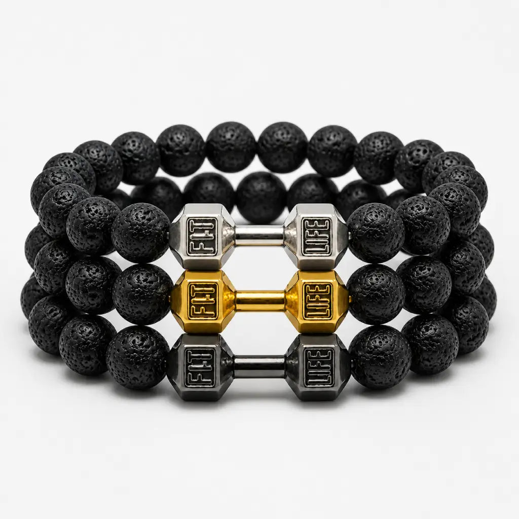 Volcanic stone bracelets set with black lava beads and gold silver dumbbell charms, stacked jewelry for bold gym style