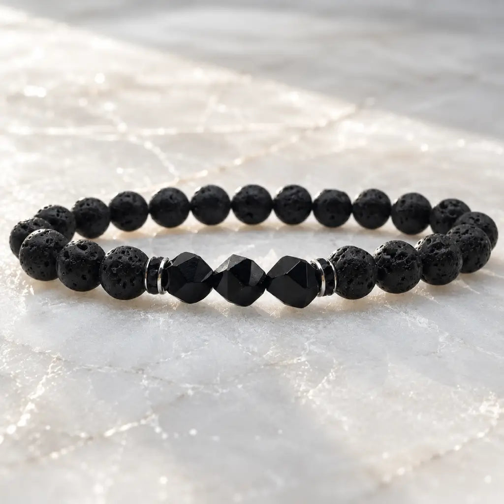 Volcanic stone bracelet on bright crystal with textured lava beads and black gemstone accents for clean energy