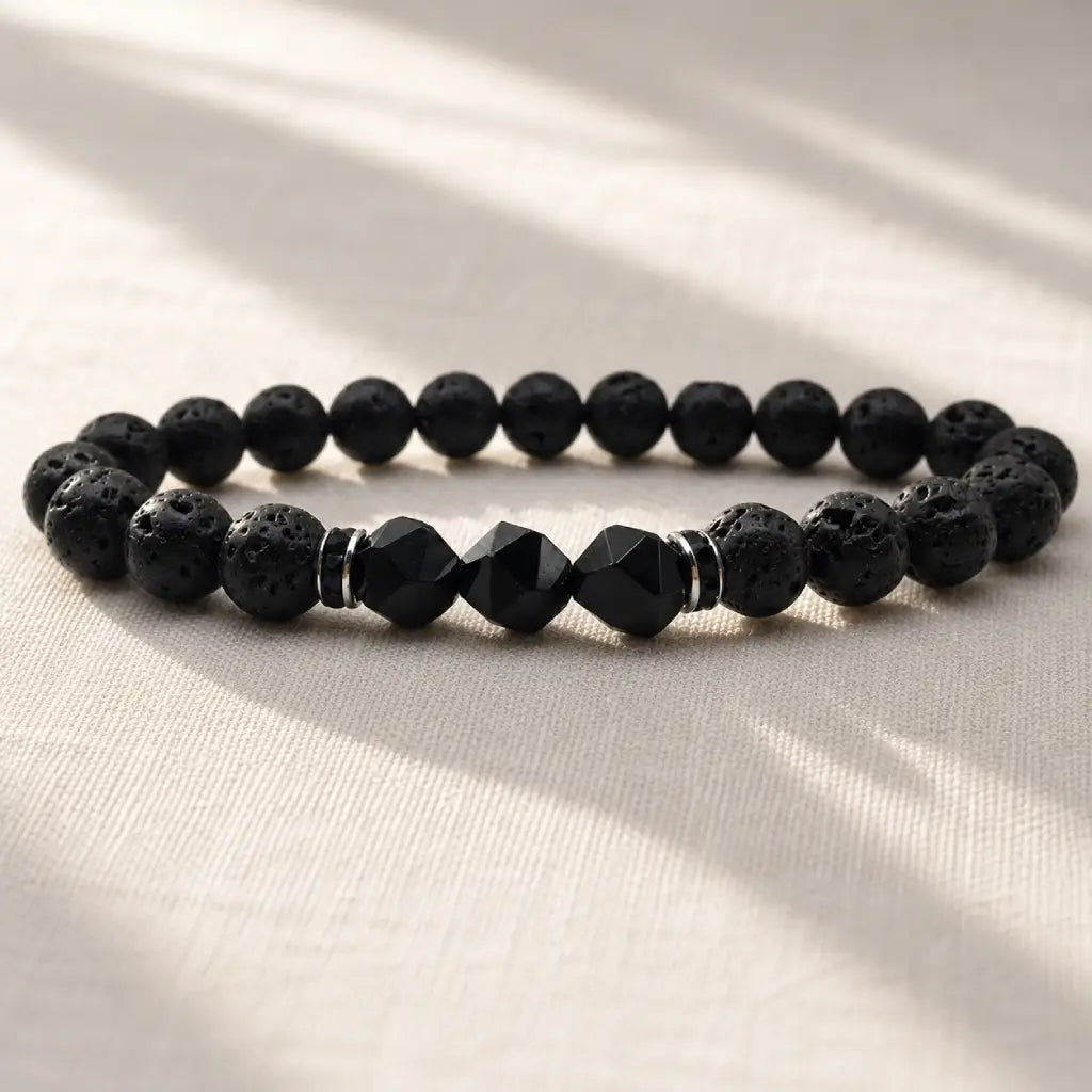Volcanic stone bracelet on soft linen with black lava beads and faceted gems for calming everyday style upgrade