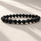 Volcanic stone bracelet on soft linen with black lava beads and faceted gems for calming everyday style upgrade
