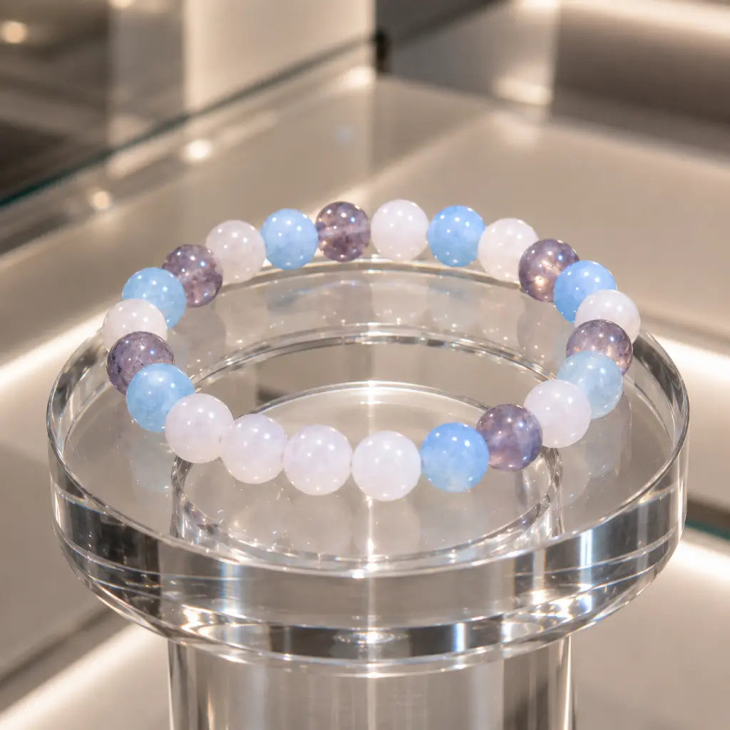 whitemoon stone-aquamarine bracelet showcased on glass display with elegant gemstone jewelry styling