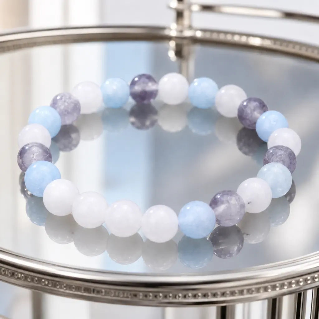 whitemoon stone-aquamarine bracelet showcased on glass display with elegant gemstone jewelry styling
