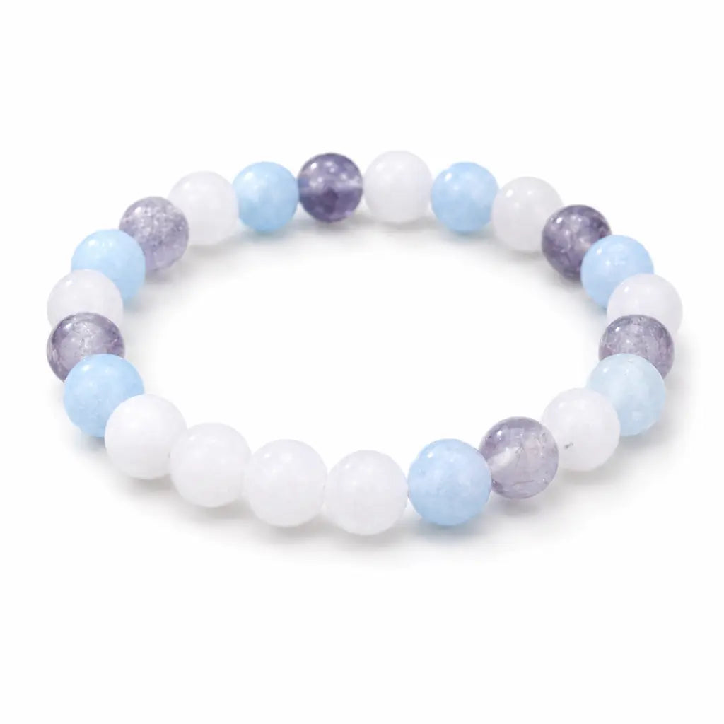 whitemoon stone-aquamarine bracelet on acrylic display with gemstone jewelry enhancing elegant fashion style