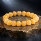 Yellow jade quartz bracelet with glossy natural gemstone beads creating a luxurious crystal jewelry look