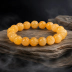 Yellow jade quartz bracelet with polished gemstone beads and healing crystal styling for calming elegance