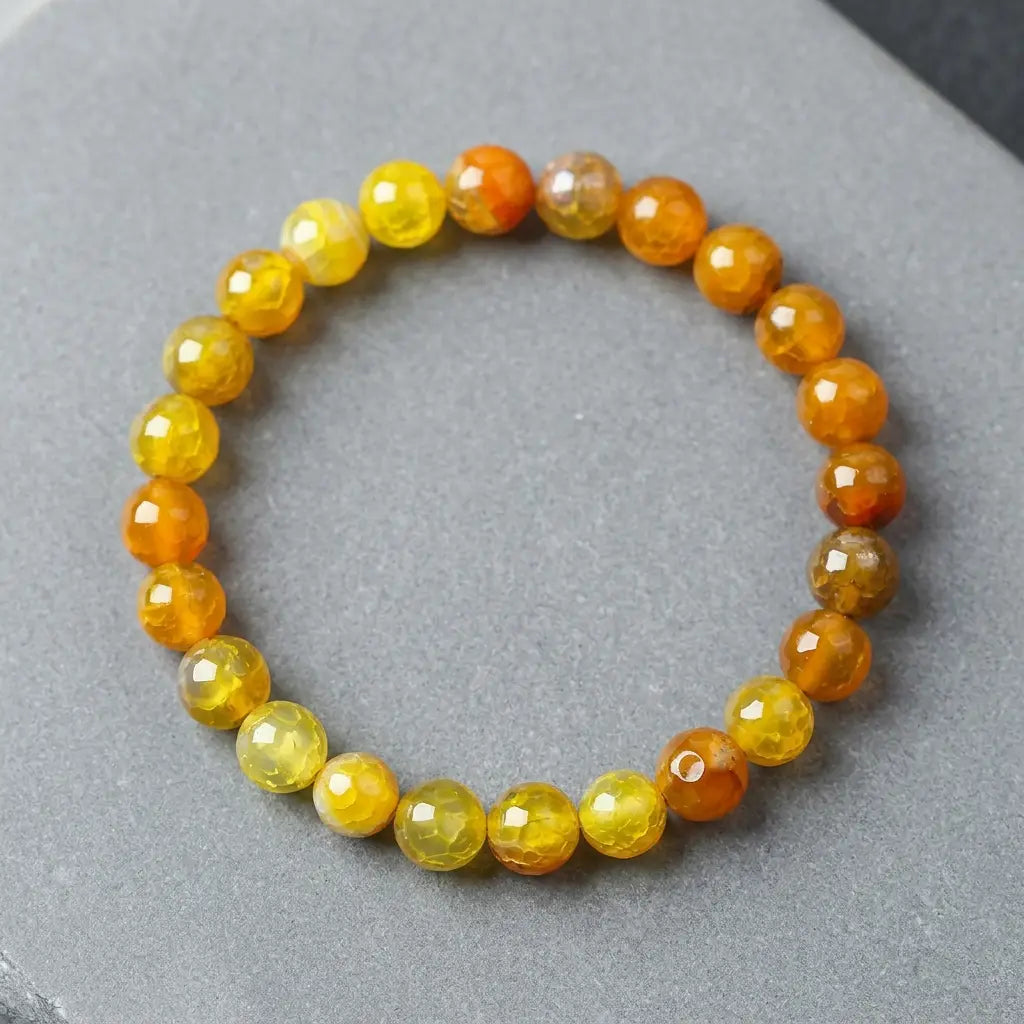 Yellow popcorn agate bracelet faceted amber yellow beads on gray stone, vibrant gemstone jewelry for cheerful style