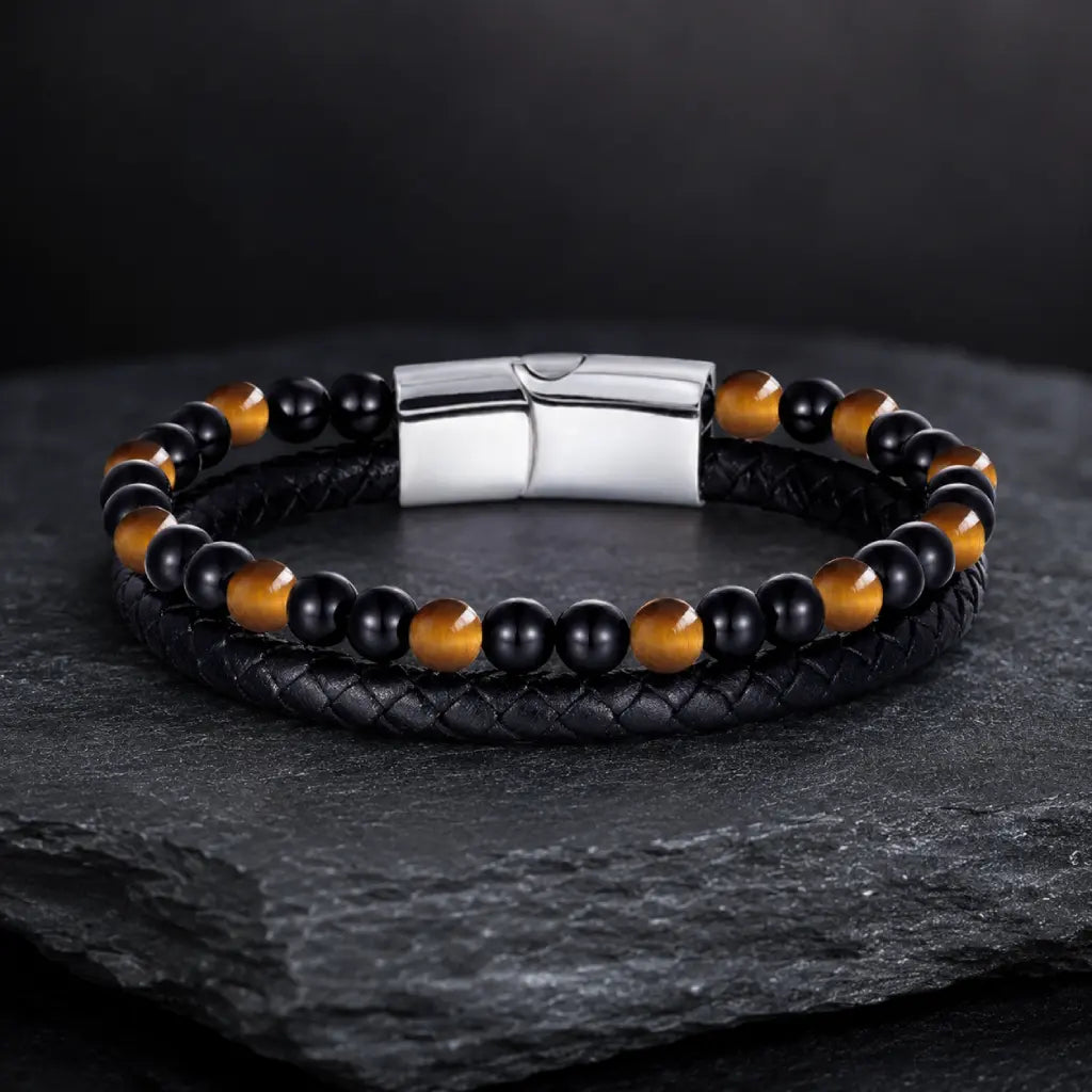 Yellow tiger eye bracelet featuring braided leather and polished beads for bold masculine fashion appeal
