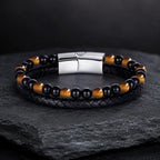 Yellow tiger eye bracelet featuring braided leather and polished beads for bold masculine fashion appeal