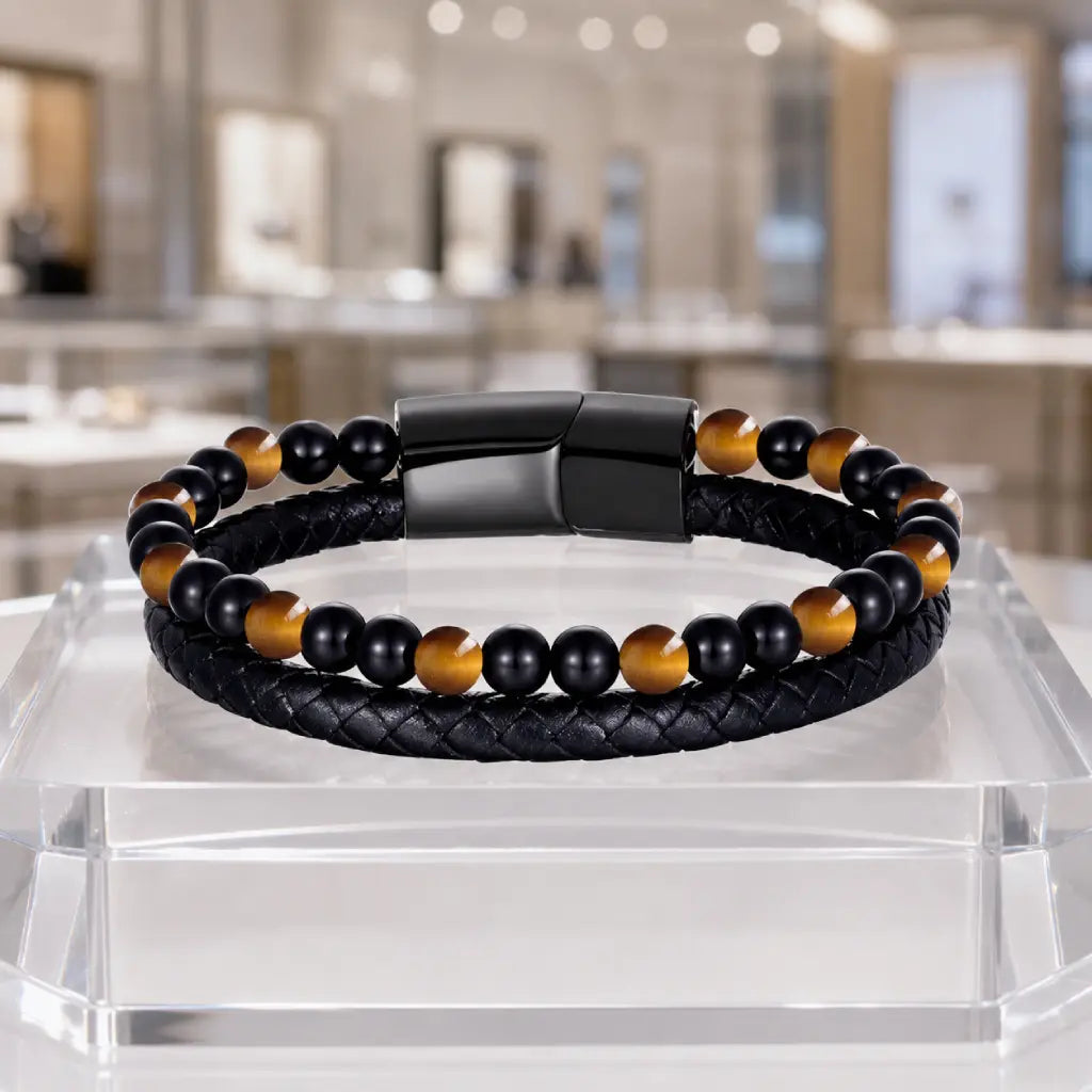 Yellow tiger eye bracelet with braided leather and polished gemstone beads in luxury jewelry display style