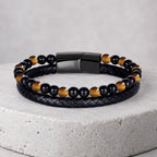 Yellow tiger eye bracelet featuring black leather and gemstone beads for modern luxury accessory appeal