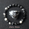 Zebra stone bracelet with a large zebra stone on a dark textured background